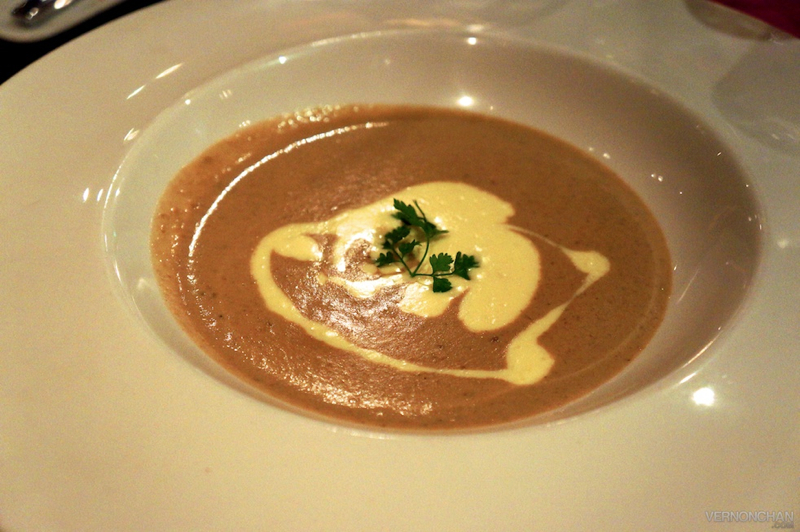 Porcini Mushroom and Truffle Soup with Melted Camembert.