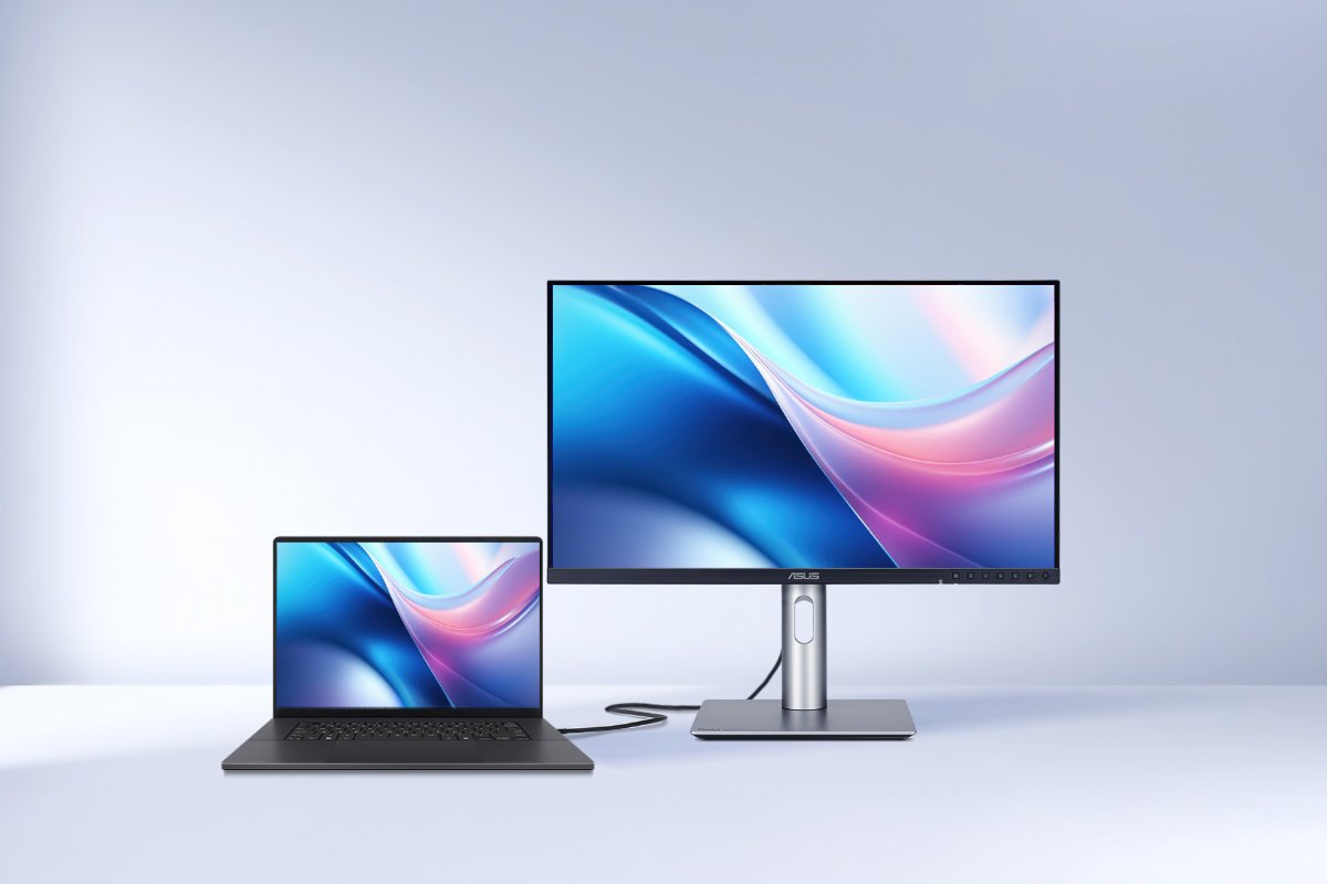 ront view of the ASUS ProArt professional monitor connected to a MacBook Pro via USB-C, demonstrating the M Model P3 color matching feature for creative professionals.